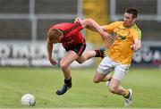 29 June 2014: Brendan Coulter, Down, in action against Barry Prior, Leitrim. GAA Football All Ireland Senior Championship, Round 1B, Down v Leitrim, Páirc Esler, Newry, Co. Down. Picture credit: David Maher / SPORTSFILE