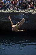 29 June 2014; Jonathan Paredes, Mexico, dives from the 28 metre platform during the seeding round of the third stop of the Red Bull Cliff Diving World Series, Inis Mor, Aran Islands, Co. Galway. Picture credit: Samo Vidic / SPORTSFILE