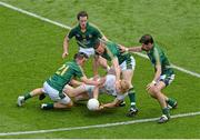 29 June 2014: Tomás O'Connor, Kildare, in action against Meath players, from left to right, Seamus Kenny, Mickey Newman, Michael Burke, and Donal Keoghan. Leinster GAA Football Senior Championship Semi-Final, Kildare v Meath, Croke Park, Dublin. Picture credit: Dáire Brennan / SPORTSFILE