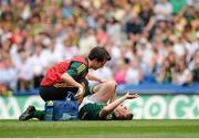 29 June 2014: Kevin Reilly, Meath, is treated for an injury in the second half. Leinster GAA Football Senior Championship, Semi-Final, Kildare v Meath. Croke Park, Dublin. Picture credit: Piaras Ó Mídheach / SPORTSFILE
