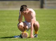 29 June 2014: A dejected Michael Bradley, Antrim, after the final whistle. GAA Hurling All-Ireland Senior Championship, Round 1, Antrim v Offaly, Ballycastle, Co. Antrim. Picture credit: Oliver McVeigh / SPORTSFILE