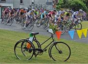 29 June 2014; A general view of the action as the peloton passes through Crookedwood during the Elite Men Road Race at the National Cycling Championships, Multyfarnham, Co. Westmeath. Picture credit: Stephen McMahon / SPORTSFILE