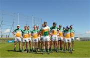 29 June 2014: The Offaly team stand for a minute's silence. GAA Hurling All-Ireland Senior Championship, Round 1, Antrim v Offaly, Ballycastle, Co. Antrim. Picture credit: Oliver McVeigh / SPORTSFILE