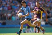 29 June 2014: Cormac Costello, Dublin, on his way to scoring his side's first goal despite the attention of Brian Malone, Wexford. Leinster GAA Football Senior Championship, Semi-Final, Dublin v Wexford. Croke Park, Dublin. Picture credit: Stephen McCarthy / SPORTSFILE