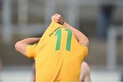 29 June 2014: Leitrim captain Emlyn Mulligan, takes his jersey off at the end of the game. GAA Football All Ireland Senior Championship, Round 1B, Down v Leitrim, Páirc Esler, Newry, Co. Down. Picture credit: David Maher / SPORTSFILE