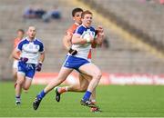 28 June 2014; Kieran Duffy, Monaghan, in action against Stephen Harold, Armagh. Ulster GAA Football Senior Championship, Semi-Final, Armagh v Monaghan, St Tiernach's Park, Clones, Co. Monaghan. Picture credit: Ramsey Cardy / SPORTSFILE