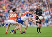 28 June 2014; Darren Hughes, Monaghan, in action against Aaron Kernan, left, and Charlie Vernon, Armagh. Ulster GAA Football Senior Championship, Semi-Final, Armagh v Monaghan, St Tiernach's Park, Clones, Co. Monaghan. Picture credit: Ramsey Cardy / SPORTSFILE