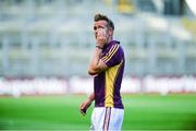 29 June 2014: PJ Banville, Wexford, leaves the field dejected after the game. Leinster GAA Football Senior Championship, Semi-Final, Dublin v Wexford. Croke Park, Dublin. Picture credit: Piaras Ó Mídheach / SPORTSFILE