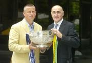 12 July 2006; Dublin manager Paul Caffrey and Offaly manager Kevin Kilmurray, right, hold the Delaney Cup at a photocall ahead of this weekend's Bank of Ireland Leinster and Connacht Senior Football Championship Finals. Bank of Ireland Head Office, Baggot Street, Dublin. Picture credit: Pat Murphy / SPORTSFILE