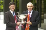 12 July 2006; Peter Forde, Galway manager, and Mikey Moran, Mayo manager, right, hold the Nestor Cup at a photocall ahead of this weekend's Bank of Ireland Leinster and Connacht Senior Football Championship Finals. Bank of Ireland Head Office, Baggot Street, Dublin. Picture credit: Pat Murphy / SPORTSFILE