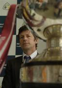 12 July 2006; Peter Forde, Galway manager, looks at the Nestor Cup during a press conference ahead of this weekend's Bank of Ireland Leinster and Connacht Senior Football Championship Finals. Bank of Ireland Head Office, Baggot Street, Dublin. Picture credit: Pat Murphy / SPORTSFILE