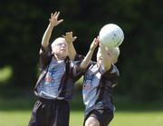 13 July 2006; Neil Fitzgerald, left, and Aaron Graham Doyle, at the North Dublin Cul Camp. The GAA Vhi Cul Camps have been extremely popular to date and are expected to attract a record 75,000 children over the summer months. The camps run through until August 25th. Erins Isle GAA Club, Co. Dublin. Picture credit: Damien Eagers / SPORTSFILE