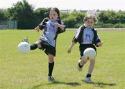 13 July 2006; Sarah Moloney, left, and Rachel Wiley at the Clare Cul Camp. The GAA Vhi Cul Camps have been extremely popular to date and are expected to attract a record 75,000 children over the summer months. The camps run through until August 25th. Clarecastle GAA Grounds, Clarecastle, Co. Clare. Picture credit: Kieran Clancy / SPORTSFILE