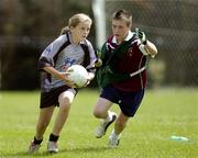 13 July 2006; Katieanne Holdcroft, age 11, from Tinure, Co. Louth and Ruairi McErlean, age 12, from Stangford, Co. Down, at the Louth Cul Camp. The GAA Vhi Cul Camps have been extremely popular to date and are expected to attract a record 75,000 children over the summer months. The camps run through til August 25th. Monasterboice GAA Grounds, Monasterboice, Co. Louth. Photo by Sportsfile