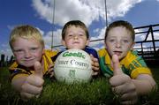 13 July 2006; Sean Neilon, left, age 7, from Dunboyne, Colm Doherty, centre, age 7, from Dublin and Ciaran Nally, age 7, from Kilcloon, at the Meath Cul Camp. The GAA Vhi Cul Camps have been extremely popular to date and are expected to attract a record 75,000 children over the summer months. The camps run through til August 25th. Dunboyne GAA Grounds, Dunboyne, Co. Meath. Photo by Sportsfile