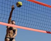 15 July 2006; Leanne Dignam spike the ball against Noya Kuncik and Ollie Rossiter. Coca-Cola Bray Beach Volleyball Event, Sand Area, Women's Round Robin, Dignam / P. Walsh v Kuncik / Rossiter, Bray Beach, Bray, Co. Wicklow. Picture credit: Brendan Moran / SPORTSFILE