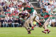 16 July 2006; Michael Meehan, Galway, in action against Ronan McGarrity and Dermot Geraghty, right, Mayo. Bank of Ireland Connacht Senior Football Championship Final, Mayo v Galway, McHale Park, Castlebar, Co. Mayo. Picture credit: Damien Eagers / SPORTSFILE