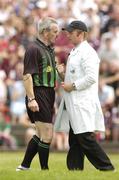 16 July 2006; Referee Paddy Russell speaks to an umpire during the match. Bank of Ireland Connacht Senior Football Championship Final, Mayo v Galway, McHale Park, Castlebar, Co. Mayo. Picture credit: Pat Murphy / SPORTSFILE