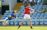 16 July 2006; Maurice O'Sullivan, Cork, in action against Colin Everard, Tipperary. Munster Intermediate Hurling Championship Final, Cork v Tipperary, Pairc Ui Chaoimh, Cork. Picture credit: Brendan Moran / SPORTSFILE