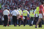 16 July 2006; Graham Canty, Cork, is stretchered off the field during the second half. Bank of Ireland Munster Senior Football Championship Final Replay, Cork v Kerry, Pairc Ui Chaoimh, Cork. Picture credit: Brendan Moran / SPORTSFILE