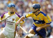 23 July 2006; Gerry O'Grady, Clare, in action against Rory Jacob, Wexford. Guinness All-Ireland Senior Hurling Championship Quarter-Final, Clare v Wexford, Croke Park, Dublin. Picture credit: Ray McManus / SPORTSFILE