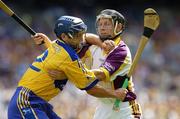 23 July 2006; Tomas Mahon, Wexford, in action against Gerry O'Grady, Clare. Guinness All-Ireland Senior Hurling Championship Quarter-Final, Clare v Wexford, Croke Park, Dublin. Picture credit: Aoife Rice / SPORTSFILE