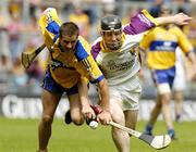 23 July 2006; Brian O'Connell, Clare, in action against Michael Jacob, Wexford. Guinness All-Ireland Senior Hurling Championship Quarter-Final, Clare v Wexford, Croke Park, Dublin. Picture credit: Matt Browne / SPORTSFILE