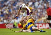 23 July 2006; Colin Lynch, Clare, in action against Ciaran Kenny, Wexford. Guinness All-Ireland Senior Hurling Championship Quarter-Final, Clare v Wexford, Croke Park, Dublin. Picture credit: Ray McManus / SPORTSFILE