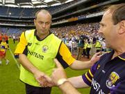 23 July 2006; Clare manager Anthony Daly, left, shakes hands with Wexford manager Seamus Murphy after the winal whistle. Guinness All-Ireland Senior Hurling Championship Quarter-Final, Clare v Wexford, Croke Park, Dublin. Picture credit: Matt Browne / SPORTSFILE