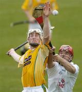 23 July 2006; Joey Scullion, Antrim, in action against Danno Horan, Kildare. Christy Ring Cup Semi-Final, Kildare v Antrim, Cusack Park, Mullingar, Co. Westmeath. Picture credit: David Maher / SPORTSFILE