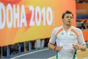 12 March 2010; Ireland's David Gillick warms up before winning his Men's 400m heat with a time of 46.72s during the 13th IAAF World Indoor Athletics Championships, Doha, Qatar. Picture credit: Pat Murphy / SPORTSFILE