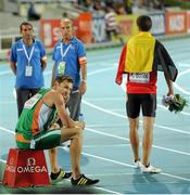 30 July 2010; A dejected David Gillick, of Ireland, sits on the track as winner Kevin Borlee, of Belgium, walks away with the bouquet. Gillick finished 5th in a time of 45.28 sec. 20th European Athletics Championships Montjuïc Olympic Stadium, Barcelona, Spain. Picture credit: Brendan Moran / SPORTSFILE