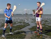 1 July 2014: Dublin’s Cian O’Callaghan and Wexford’s Jack Guiney at Dollymount Strand in Dublin today ahead of the Bord Gáis Energy GAA Hurling U-21 Leinster Championship Final at Parnell Park on Wednesday, July 9th at 7.30pm where Dublin will play Wexford. The match will be shown live on TG4 with fans able to vote for their man of the match using the #LaochBGE hashtag on Twitter. Picture credit: David Maher / SPORTSFILE