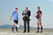 1 July 2014: Ger Cunningham, Bord Gais Energy Sports Ambassador, with Dublin’s Cian O’Callaghan and Wexford’s Jack Guiney at Dollymount Strand in Dublin today ahead of the Bord Gáis Energy GAA Hurling U-21 Leinster Championship Final at Parnell Park on Wednesday, July 9th at 7.30pm where Dublin will play Wexford. The match will be shown live on TG4 with fans able to vote for their man of the match using the #LaochBGE hashtag on Twitter. Picture credit: David Maher / SPORTSFILE
