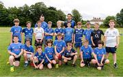 2 July 2014; Leinster's Cian Healy and Kevin McLaughlin with the 11 and 12's group during the Herald Leinster Rugby Summer Camps in Old Belvedere RFC, Donnybrook, Dublin. Picture credit: Barry Cregg / SPORTSFILE