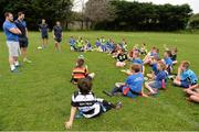2 July 2014; Leinster's Cian Healy and Kevin McLaughlin answer questions from the 9 and 10's group during the Herald Leinster Rugby Summer Camps in Old Belvedere RFC, Donnybrook, Dublin. Picture credit: Barry Cregg / SPORTSFILE