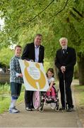 3 July 2014: Former Republic of Ireland international Packie Bonner, left, and Director of Spina Bifida Hydrocephalus Ireland Fiach McDonagh with Matt Dooley, age 9, from Blanchardstown, Co. Dublin, and Sophie Biggins, age 7, from Swords, Co Dublin, at the official launch of the Packie Bonner 2014 Golf Classic in aid of Spina Bifida Hydrocephalous Ireland. The Barge Pub, Charlemount Street, Dublin. Picture credit: Matt Browne / SPORTSFILE