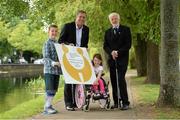 3 July 2014: Former Republic of Ireland international Packie Bonner, left, and Director of Spina Bifida Hydrocephalus Ireland Fiach McDonagh with Matt Dooley, age 9, from Blanchardstown, Co. Dublin, and Sophie Biggins, age 7, from Swords, Co Dublin, at the official launch of the Packie Bonner 2014 Golf Classic in aid of Spina Bifida Hydrocephalous Ireland. The Barge Pub, Charlemount Street, Dublin. Picture credit: Matt Browne / SPORTSFILE
