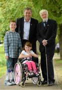 3 July 2014: Former Republic of Ireland international Packie Bonner, left, and Director of Spina Bifida Hydrocephalus Ireland Fiach McDonagh with Matt Dooley, age 9, from Blanchardstown, Co. Dublin, and Sophie Biggins, age 7, from Swords, Co. Dublin, at the official launch of the Packie Bonner 2014 Golf Classic in aid of Spina Bifida Hydrocephalous Ireland. The Barge Pub, Charlemount Street, Dublin. Picture credit: Matt Browne / SPORTSFILE