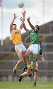 5 July 2014; John Galvin, Limerick, and Niall McKeever, Antrim, contest a kick out. GAA Football All-Ireland Senior Championship, Round 2A, Limerick v Antrim, Gaelic Grounds, Limerick. Picture credit: Brendan Moran / SPORTSFILE