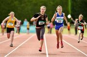 5 July 2014; Kristina O'Connor, Blackrock Dublin AC, second from left, crosses the finish line to win the Girl's U13 4x100m final event. GloHealth AAI Juvenile Track and Field Relay Championships, Tullamore, Co. Offaly. Picture credit: Pat Murphy / SPORTSFILE