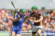 5 July 2014;  Cathal McInerney, Clare, in action against Matthew O'Hanlon, Wexford. GAA Hurling All-Ireland Senior Championship, Round 1, Clare v Wexford, Cusack Park, Ennis, Co. Clare. Picture credit: Ray McManus / SPORTSFILE