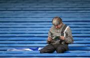 5 July 2014;  A supporter reads his programme before the game. GAA Football All Ireland Senior Championship, Round 2a, Tipperary v Longford, Semple Stadium, Thurles, Co. Tipperary.  Picture credit: Stephen McCarthy / SPORTSFILE