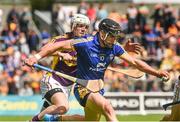 5 July 2014;  John Conlon, Clare, in action against Ciarán Kenny, Wexford. GAA Hurling All-Ireland Senior Championship, Round 1, Clare v Wexford, Cusack Park, Ennis, Co. Clare. Picture credit: Ray McManus / SPORTSFILE