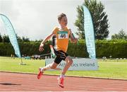 5 July 2014; Michael Farrelly, Portmarnock AC, crosses the finish line to win the Boy's U13 4x100m final event. GloHealth AAI Juvenile Track and Field Relay Championships, Tullamore, Co. Offaly. Picture credit: Pat Murphy / SPORTSFILE