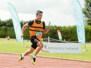 5 July 2014; Robert Creagan, Leevale AC, crosses the finish line to win the Boy's U15 4x100m final event. GloHealth AAI Juvenile Track and Field Relay Championships, Tullamore, Co. Offaly. Picture credit: Pat Murphy / SPORTSFILE