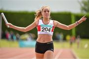5 July 2014; Maeve Brannigan, Galway City Harriers AC, celebrates as she crosses the finish line to win the Girl's U18 4x400m final event. GloHealth AAI Juvenile Track and Field Relay Championships, Tullamore, Co. Offaly. Picture credit: Pat Murphy / SPORTSFILE