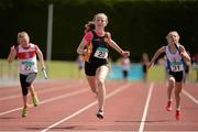 5 July 2014; Emma O'Brien, Blackrock Dublin AC, on her way to winning the Girl's U12 4x100m final event. GloHealth AAI Juvenile Track and Field Relay Championships, Tullamore, Co. Offaly. Picture credit: Pat Murphy / SPORTSFILE