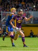 5 July 2014; Liam Óg McGovern, Wexford, is tackled by Colm Galvin, Clare. GAA Hurling All-Ireland Senior Championship, Round 1, Clare v Wexford, Cusack Park, Ennis, Co. Clare. Picture credit: Ray McManus / SPORTSFILE