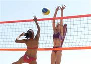 15 July 2006; Doireann Counihan, left, in action against Eleanor Dunne. Bray Beach Volleyball Event, Sand Area, Women's Round Robin, Dunne / Gormally  v Counihan / J. Walsh, Bray Beach, Bray, Co. Wicklow. Picture credit: Brendan Moran / SPORTSFILE